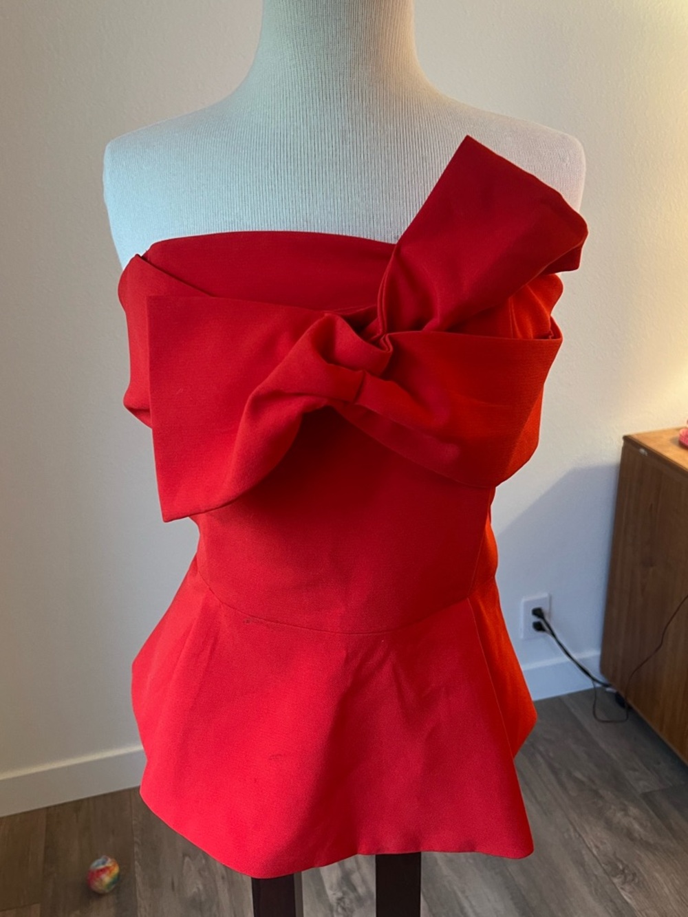 Strapless Red Bow-Accent Peplum top